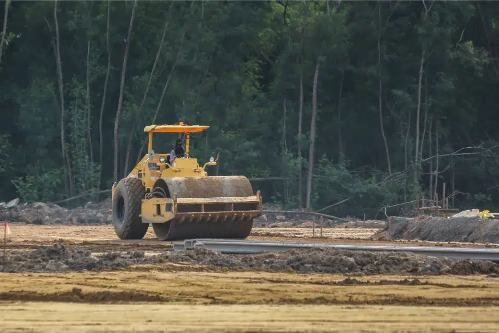 bulldozer in forest being used for land clearing bulldozer in forest being used for land clearing